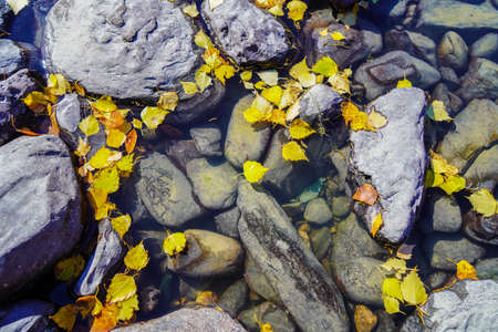 Stones on the shore of Moon Bay in Kanas, Altay, Xinjiang