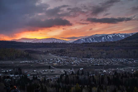 Watch the sunrise and morning fog from the viewing platform of Hemu Village, Xinjiangの写真素材
