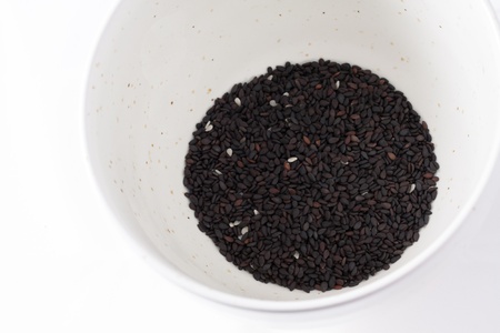 Black and white sesame in a japanese bowlの写真素材