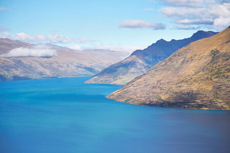 Lake Wakatipu and mountain range, Queenstown, New Zealandの写真素材