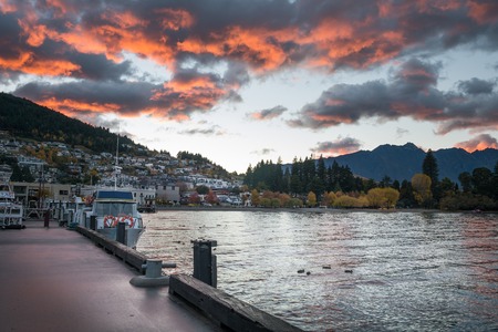 Lake Wakatipu at Queenstown with dramatic morning sky, South Island, New Zealandの写真素材