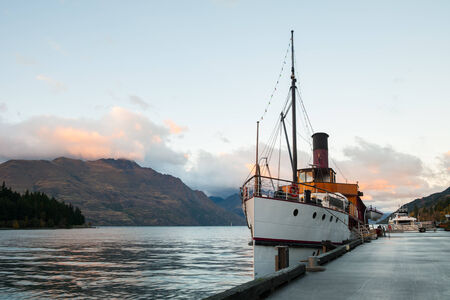 Vintage ship at Lake Wakatipu in the morning, Queenstown, New Zealandの写真素材