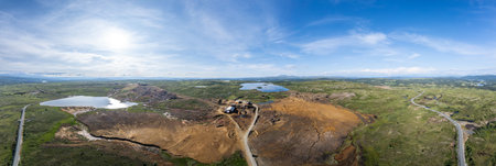 Expansive Aerial Panoramic view captures the remnants of a closed copper mine in RÃ¸ros, Norway,...