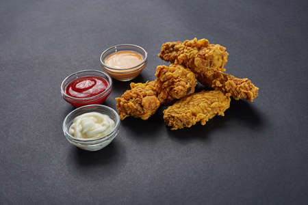 crispy kentucky fried chicken in beauty black backgroundの写真素材