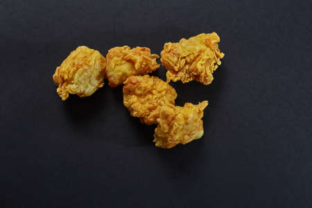 crispy kentucky fried chicken in beauty black backgroundの写真素材