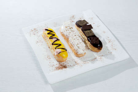 Delicious little dessert with strawberries and cocolate in white woodの写真素材
