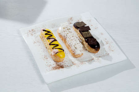 Delicious little dessert with strawberries and cocolate in white woodの写真素材