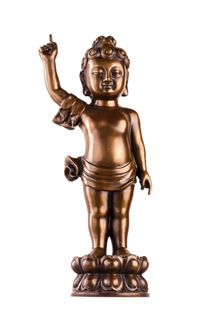 Young prince Siddhartha Gautama on a lotus flower. The figure made of metal isolated on a white background.の写真素材