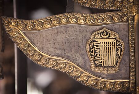 The Buddhist flag made of metal with a tradition mantra a kalachakra symbol.のeditorial素材