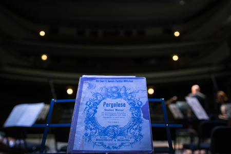 Old music book with notes of the cantata of Stabat Mater of the Italian composer of Pergolese on the stage of the Kharkiv Opera Theatre. Ukraine, Kharkiv, KHNATOB, on April 25, 2018のeditorial素材