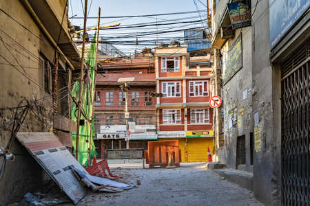 March 30, 2020. Kathmandu, Nepal. The secondary streets closed on quarantine. One can see the deserted main street with closed shops.のeditorial素材