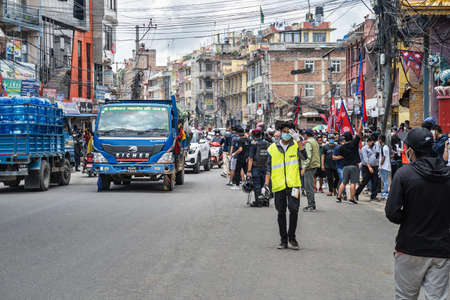 March 30, 2020. Kathmandu, Nepal. Evening. The Stupa Boudha closed on quarantine. One can see the deserted central way to the stupa from the street.のeditorial素材