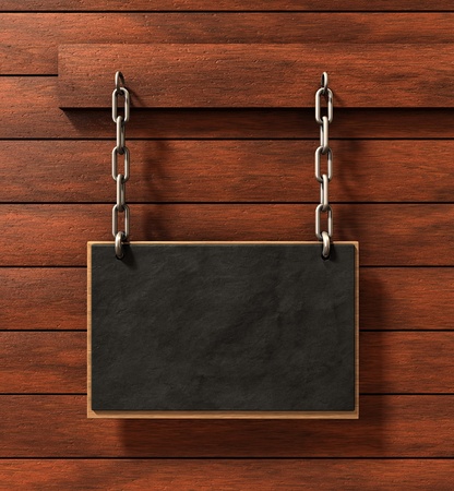 Chalkboard on brown wood backgroundの写真素材