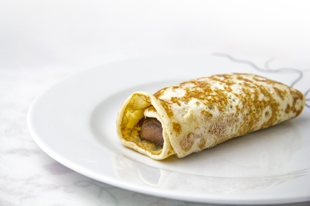 Chocolate crepe on a dishの写真素材