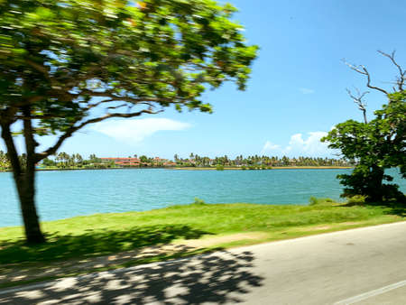View from the road to the city across the oceanの写真素材