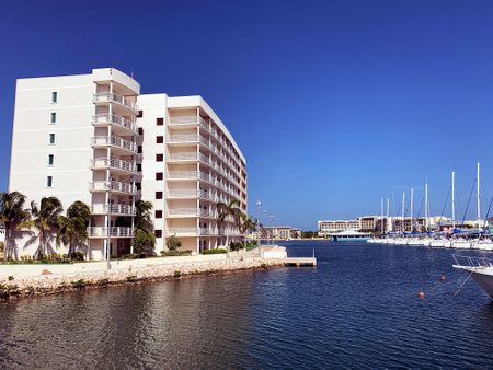 Boats stand in the port, view of the water and the buildingの写真素材