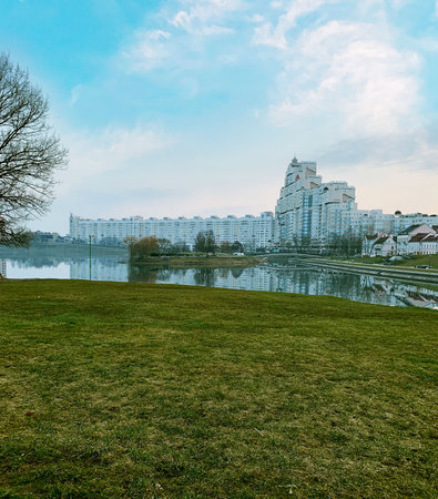 View from the lawn near the pond to the big houseの写真素材