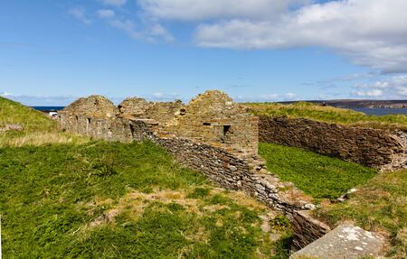 The Flagstone Heritage Trail and the Castlehill Heritage Centre between them celebrate the memory of the flagstone industry in this part of Caithness in Scotland. This photo shows the remain of the former production units.の写真素材