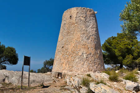 old water tower in the bay of Canyamel on the Balearic island of Mallorcaの写真素材