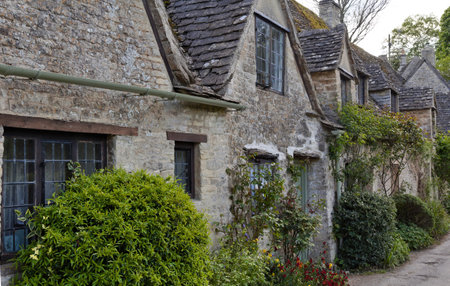 Arlington Row in the village of Bibury in the Cotswolds, owned by the National Trust, is one of...