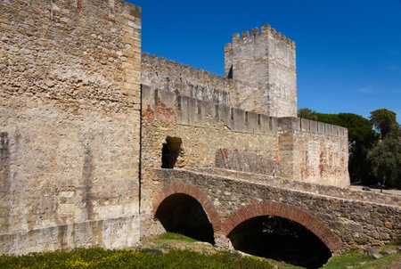 A brige to an entrance to the medieval Sao Jorge Castle in Portugal's capital Lisbonの写真素材