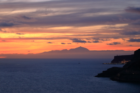 Sunset over Canary Islands, view from Gran Canaria to Tenerife, El Teide volcano in Spainの写真素材