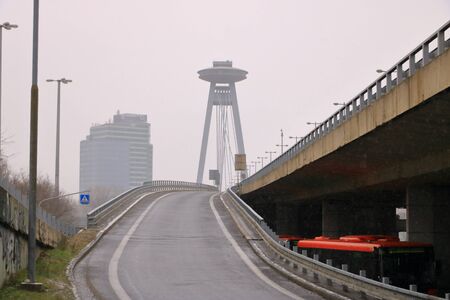 January 26 2019 - Bratislava, Slovakia: View on the Modern bridge with observation deck and restaurant called UFO in Bratislava city in winterの写真素材