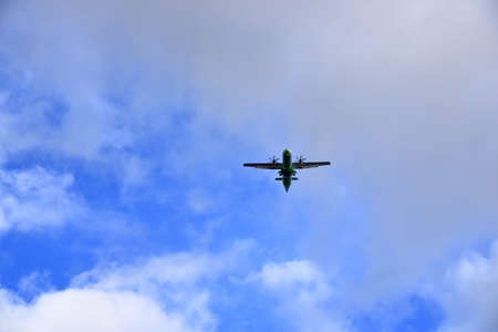 January 25 2020 - La Gomera, Canary Islands, Spain: Airplane flying in the sky over the Islandのeditorial素材