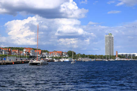 August 22 2020 - Travemuende / Germany: Famous Baltic Sea marina with a lot of berths and a lot of sailing boats in the water against a blue skyのeditorial素材