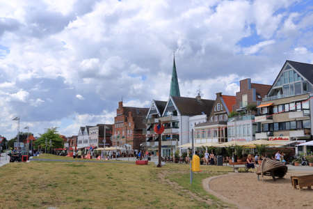 August 22 2020 - Travemuende / Germany: View of the pedestrian promenade along the Baltic sea beach...
