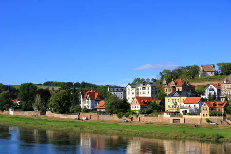 July 26 2020 - Meissen / Germany: old former fisherman's houses on the bank of the river Elbe in the area of Meissen, Saxonyのeditorial素材