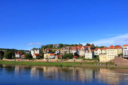 July 26 2020 - Meissen / Germany: old former fisherman's houses on the bank of the river Elbe in the area of Meissen, Saxonyのeditorial素材