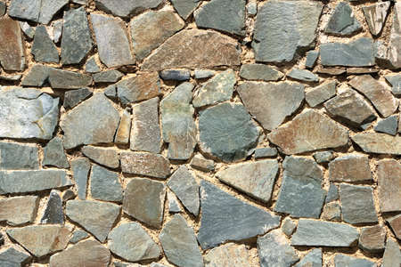 Background of a decorate green stone wall surface