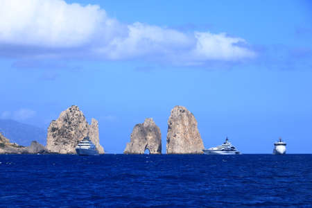 The Faraglioni Rocks on the coast of the island of Capri in Italyの写真素材