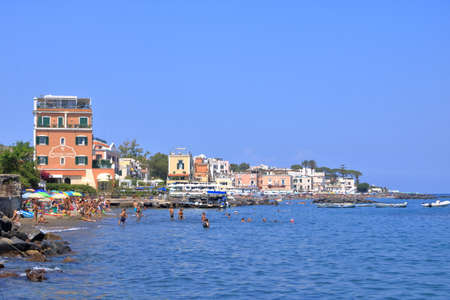 July 22 2021 - Ischia, Italy: A Crowd of resting tourists on Public beach of Ischia