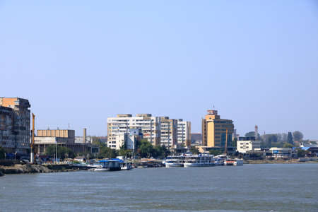 September 13 2021 - Tulcea in Romania :: View of the harbor area and Skyline of the Tulcea Danube Deltaのeditorial素材