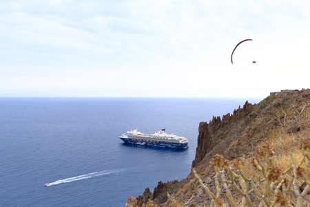 November 25 2021 - Santa Cruz, Tenerife, Spain: Cruise ship Mein Schiff Herz anchored near coast of Tenerife during the covid 19 pandemicのeditorial素材