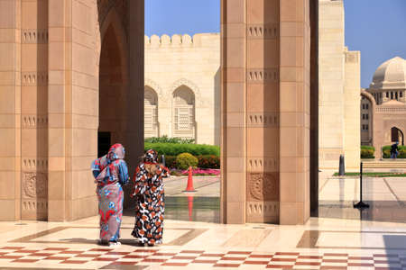 March 16 2022 - Muscat, Oman: People visit Sultan Qaboos Grand Mosqueのeditorial素材