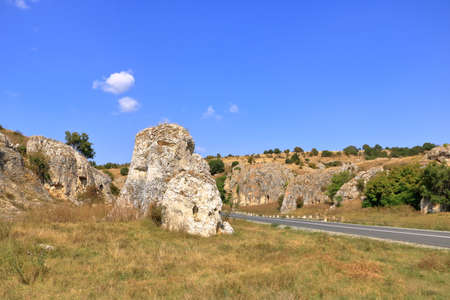 a mountain landscape with some of the oldest limestone rock formations in Europe, in Dobrogea Gorges...