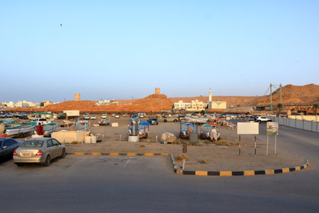 March 21 2022 - Sur, Oman: image of street life in Sur town with white houses in the Southern Oman