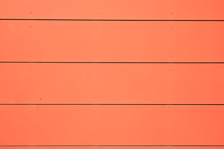 orange striped fabric texture in a close up view.
