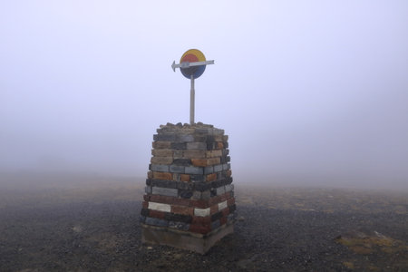 Midnight Sun Monument at Nordkapp North Cape on a foggy dayの写真素材