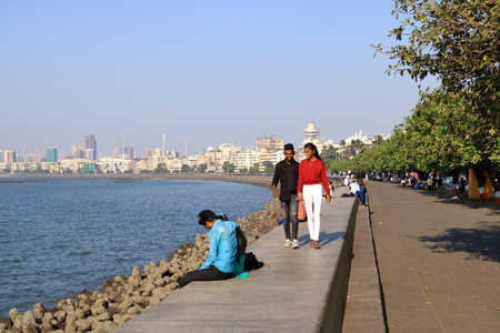 December 20 2022 - Mumbai, Maharashtra in India: People enjoy the afternoon in front of the Mumbai...