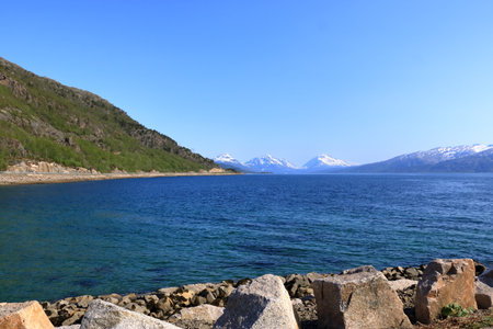 Mountains and fjords on Lofoten islands, Norway, viewed from the boatの写真素材