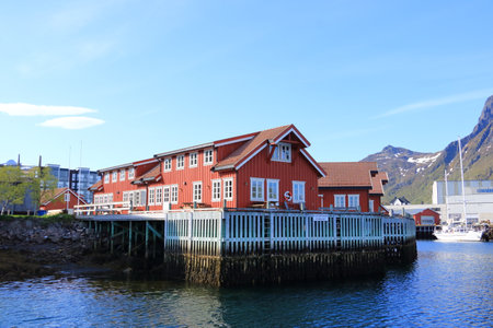 May 29 2022 - Svolvaer, Lofoten, Norway: a View of the city on the Lofoten islands, beautiful bright landscape, traditional red housesのeditorial素材