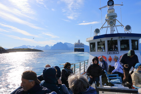 May 29 2022 - Svolvaer, Lofoten, Norway: the Havila Kystruten cruise liner Havila Castor sails through the fjordのeditorial素材