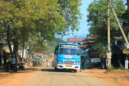 December 29 2022 - Kannur district, Kerala in India: Indian Traffic on dusty streetsのeditorial素材