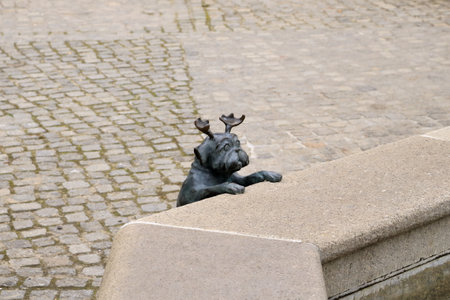 April 7 2023 - Brandenburg in Germany: wood pug sculpture in the city, in memory of Loriotのeditorial素材