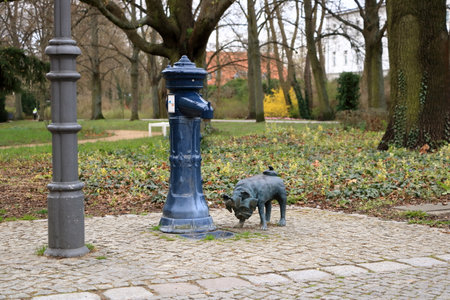 April 7 2023 - Brandenburg in Germany: wood pug sculpture in the city, in memory of Loriotのeditorial素材