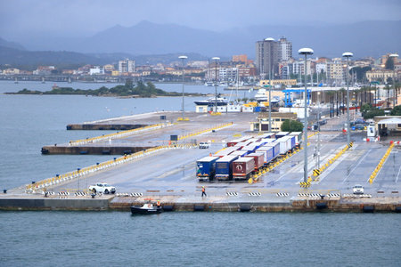 May 20 2023 - Olbia, Sardinia in Italy: : the ferry approaching the the port of Olbia on a cloudy dayのeditorial素材